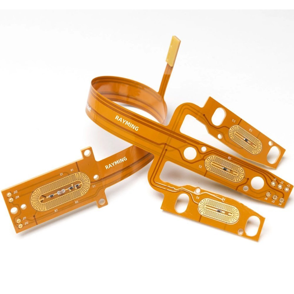 Flexible circuit sample loops | GlobalWin Several amber flexible circuit samples arranged in curved loops